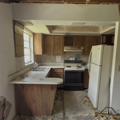 Dated kitchen in a Ruskin home before demolition
